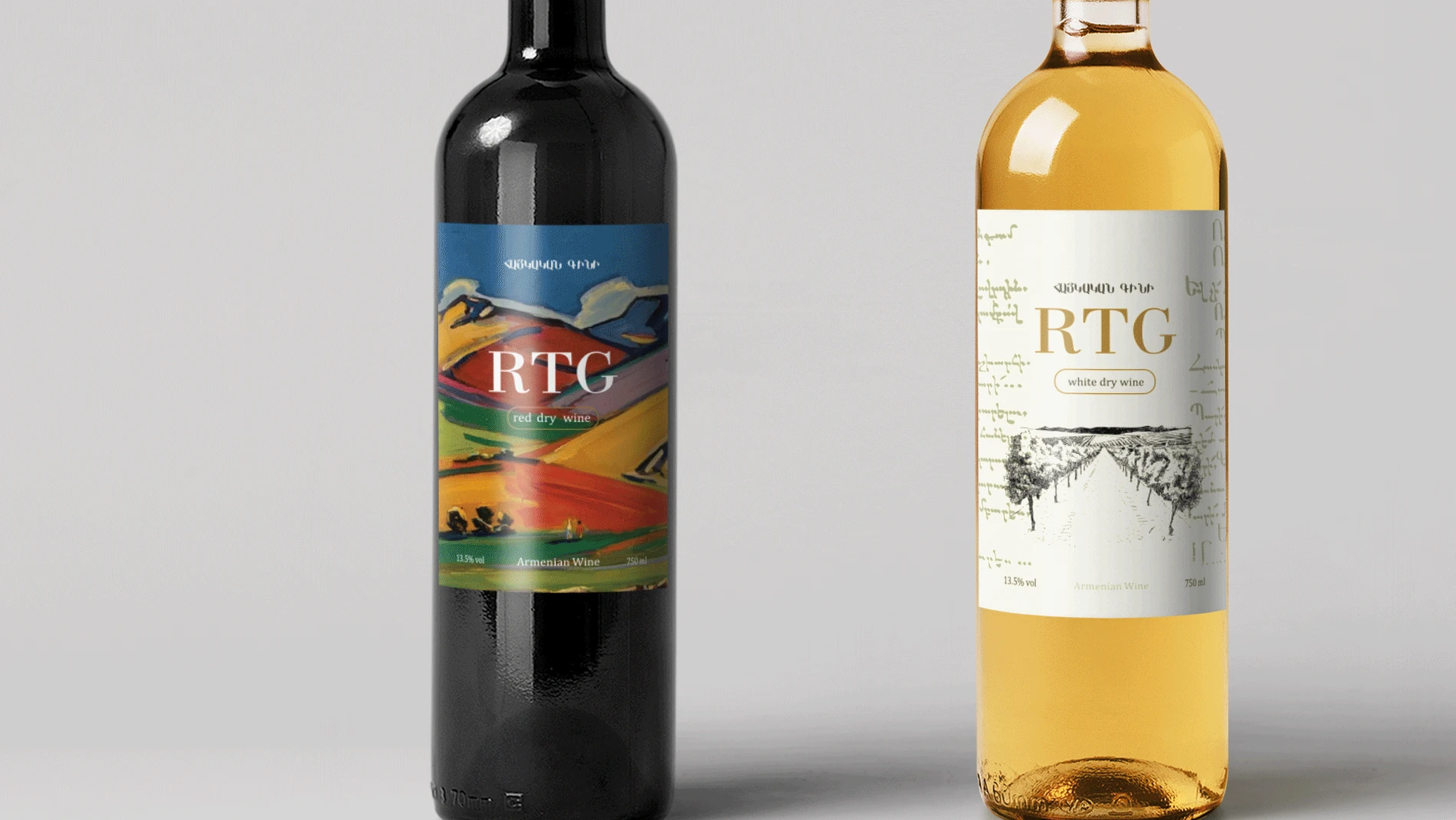 A close view of two wine labels: one with an illustrated landscape in orange and green above the RTG monogram, one plain terracotta with the monogram alone.